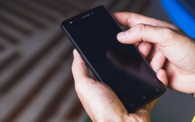 from-hand-using-smartphone-scaled.jpg - JurnalDirect