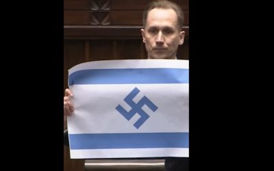 Deputat de extremă dreaptă, șoc în Parlamentul Poloniei: steag israelian cu svastică